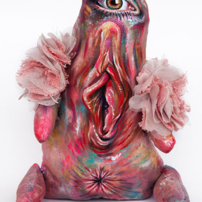 Painted doll with a vulva for a mouth